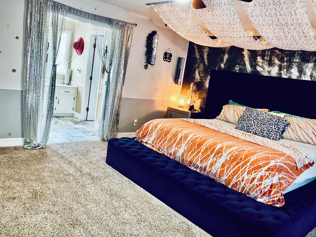 Zen Villa master bedroom with velvet bed, Villa Rica GA